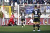 Monza's Patrick Ciurria, left, scores his side's opening gaol during the Serie A soccer match between Monza and Empoli at the Monza Brianteo stadium, Italy, Saturday, March 4, 2023. (Claudio Grassi/LaPresse via AP)