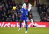 Leicester City's Kelechi Iheanacho, left, and Southampton's Armel Bella-Kotchap battle for the ball during their English Premier League soccer match at St. Mary's Stadium, Southampton, England, Saturday, March 4, 2023. (Andrew Matthews/PA via AP)