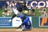 Toronto Blue Jays' Wynton Bernard (67) steals second as Detroit Tigers second baseman Cesar Hernandez can't field a wild throw during the fourth inning of a spring training baseball game in Lakeland, Fla., on Saturday, March 4, 2023. THE CANADIAN PRESS/AP-Chris O'Meara