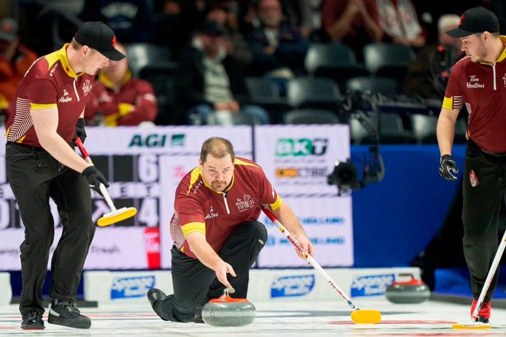 Nunavut skip Jake Higgs releases his shot during the 10th end of their win over Newfoundland and Labrador at the 2023 Tim Hortons Brier at Budweiser Gardens in London, Ont., Saturday, March 4, 2023. THE CANADIAN PRESS/Geoff Robins
