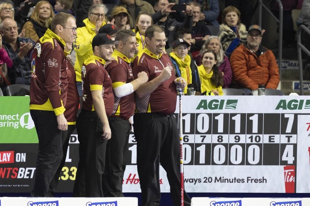 Team Nunavut celebrate their win over Team Newfoundland & Labrador during the Tim Hortons Brier at Budweiser Gardens in London, Ont. on Saturday, March 4, 2023. THE CANADIAN PRESS / Nicole Osborne