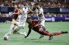 Toronto FC defender Matt Hedges, left, Atlanta United midfielder Derrick Etienne, center, and Toronto FC midfielder Jonathan Osorio, battle for the ball during the second half of an MLS soccer match, Saturday, March 4, 2023, in Atlanta. (AP Photo/Alex Slitz)