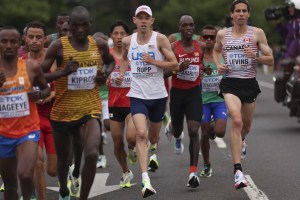 Galen Rupp, of the United States, and Cam Levins of Canada (right) compete during the men's marathon at the World Athletics Championships in Eugene, Ore., Sunday, July 17, 2022.&nbsp;Levins broke both the national and North American records at the Tokyo Marathon on Saturday. THE CANADIAN PRESS/AP-Patrick Smith/Pool Photo via AP