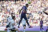 Barcelona's Raphinha scores his side's opening goal during Spanish La Liga soccer match between Barcelona and Valencia at the Camp Nou stadium in Barcelona, Spain, Sunday, March 5, 2023. (AP Photo/Joan Monfort)