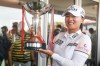 Jin Young Ko of South Korea poses with the trophy after winning the HSBC Women's World Championship at the Sentosa Golf course, in Singapore, Sunday, March 5, 2023. (AP Photo/Danial Hakim)