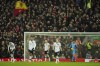 Manchester United players react after Liverpool's Mohamed Salah scored his side's sixth goal during the English Premier League soccer match between Liverpool and Manchester United at Anfield in Liverpool, England, Sunday, March 5, 2023. (AP Photo/Jon Super)