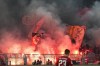 Leipzig's fans light fireworks during the German Bundesliga soccer match between Borussia Dortmund and RB Leipzig in Dortmund, Germany, Friday, March 3, 2023. (AP Photo/Martin Meissner)