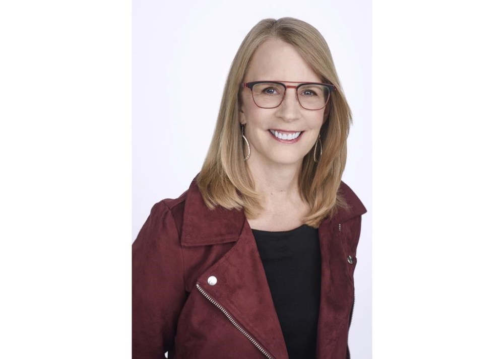 FILE - This undated file photo provided by NerdWallet shows Liz Weston, a columnist for personal finance website NerdWallet.com. Many people don’t realize that divorced spouses can claim Social Security benefits based on their ex’s earnings record, as long as the marriage lasted at least 10 years. But the rules can be tricky and can differ, depending on whether your former spouse is dead or alive. (NerdWallet via AP, File)