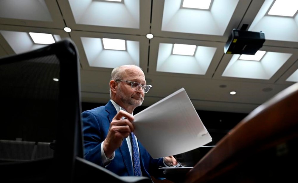 Minister of Justice David Lametti prepares to appear before the Standing Committee on Justice and Human Rights in Ottawa, Monday, March 6, 2023. Lametti told the Parliamentary committee meeting Monday he is prepared to make changes to the Criminal Code and has already talked with some provincial counterparts about bail reform. THE CANADIAN PRESS/Justin Tang