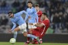 Lazio's Pedro, left, vies for the ball with AZ Alkmaar's Vangelis Pavlidis, during the Europa Conference League round of 16 first leg soccer match between Lazio and AZ Alkmaar, at Olympic Stadium, in Rome, Tuesday, March 7, 2023. (Alfredo Falcone/LaPresse via AP)