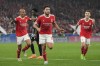 Benfica's Goncalo Ramos scores, centre, celebrates after scoring his side's second goal during the Champions League, round of 16, second leg soccer match between Benfica and Club Brugge at the Luz stadium in Lisbon, Portugal, Tuesday, March 7, 2023. (AP Photo/Armando Franca)