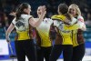 DARRYL DYCK / THE CANADIAN PRESS
Manitoba skip Jennifer Jones, right, celebrates with second Mackenzie Zacharias, front right, alternate Lauren Lenentine, left, and third Karlee Burgess, back, after defeating Northern Ontario in a playoff match to reach the final at the Scotties Tournament of Hearts, in Kamloops, B.C., on Saturday, February 25, 2023.