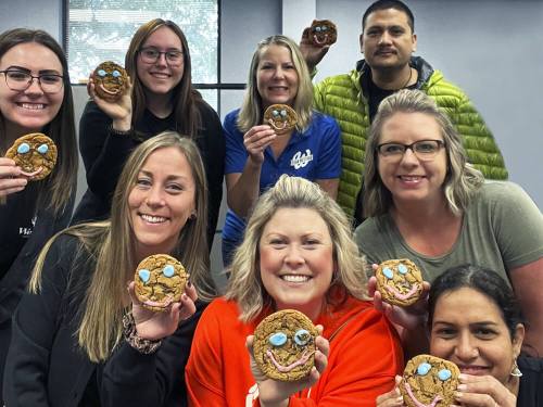 Westoba Credit Union employees taking part in the ‘Smile Cookie’ campaign to support local charities.