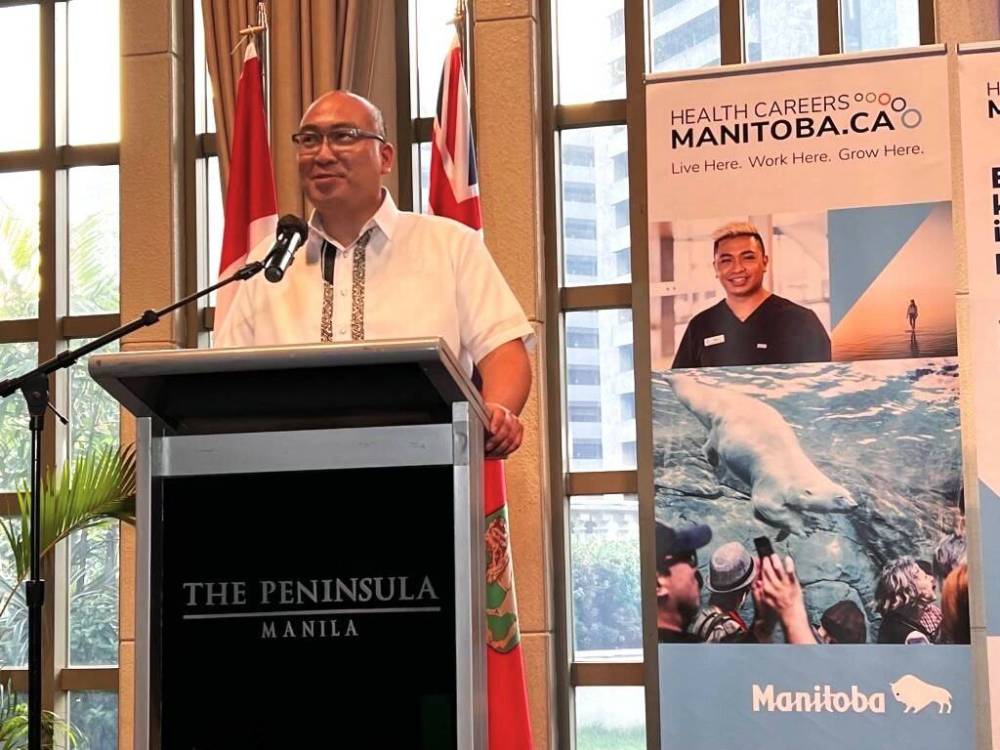 Labour and Immigration Minister Jon Reyes making a presentation while in the Philippines at the Peninsula Manila hotel during a recent nurse recruiting trip. (Submitted)