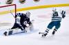 Fred Greenslade / THE CANADIAN PRESS
                                San Jose’s Logan Couture scores the overtime winner against Jets goaltender David Rittich Monday night at Canada Life Centre.