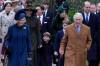 King Charles III, right, and Camilla, the Queen Consort, lead the Royal Family as they arrive at a Christmas Day service. The King will be officially crowned on May 6. (Kirsty Wigglesworth / The Asssociated Press files)