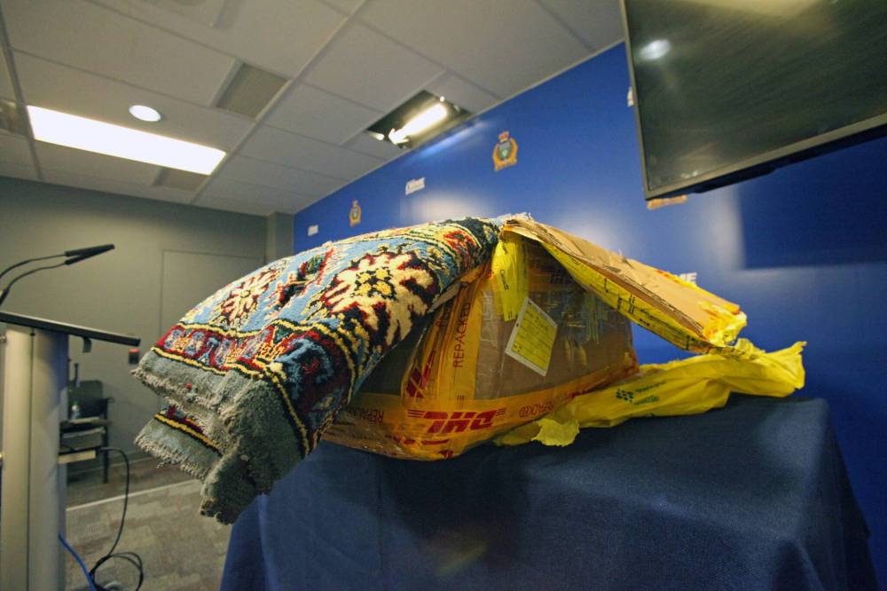 Carpets containing opium was seized in a joint investigation by the Winnipeg police and Canada Border Services Agency targetting opium and heroin trafficking on March 9, 2023. (Erik Pindera / Winnipeg Free Press)