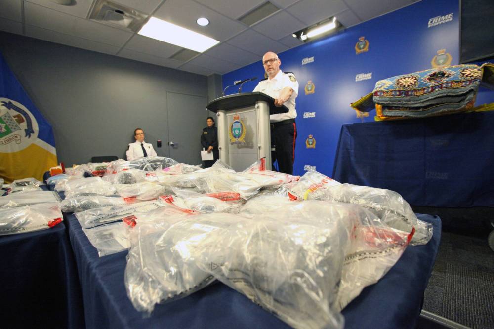 Winnipeg Police Service Insp. Elton Hall speaks to reporters about large heroin and opium smuggling busts that resulted from a joint investigation with the Canada Border Services Agency. (Erik Pindera / Winnipeg Free Press)