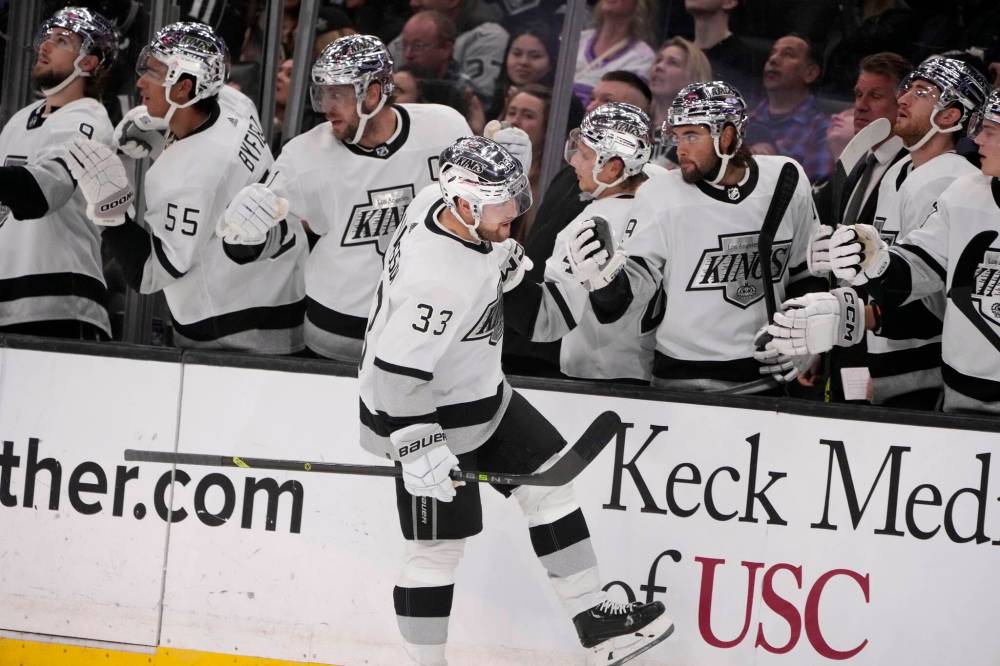 MARCIO JOSE SANCHEZ / THE ASSOCIATED PRESS
Los Angeles Kings right wing Viktor Arvidsson (33) celebrates his goal with teammates during the first period.