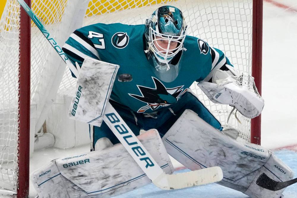(AP Photo/Tony Avelar)
Sharks goaltender James Reimer from Morweena, Manitoba, was outstanding, stopping all 41 shots on net in the Sharks 3-0 win over the Winnipeg Jets.