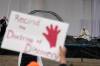 People protest as Pope Francis meets young people and elders at Nakasuk Elementary School Square in Iqaluit in 2022. (The Associated Press files)