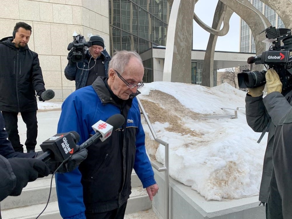 Arthur Masse leaves court at the Law Courts building in Winnipeg, Tuesday, March 7, 2023. Closing arguments in the trial of a retired priest accused of assaulting a First Nations woman while she was a student at a former residential school are expected to begin this morning in Winnipeg. THE CANADIAN PRESS/Brittany Hobson
