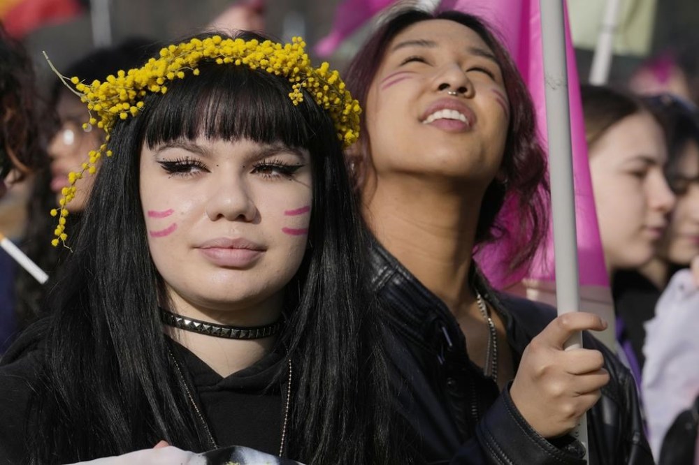 People march during a rally on International Women's Day in Milan, Italy, Wednesday, March 8, 2023. (AP Photo/Luca Bruno)