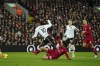 Manchester United's Marcus Rashford is tackled by Liverpool's Trent Alexander-Arnold during the English Premier League soccer match between Liverpool and Manchester United at Anfield in Liverpool, England, Sunday, March 5, 2023. (AP Photo/Jon Super)