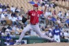 Cincinnati Reds starting pitcher Nick Lodolo throws a pitch against the Los Angeles Dodgers during the second inning of a spring training baseball game Tuesday, Feb. 28, 2023, in Phoenix. (AP Photo/Ross D. Franklin)