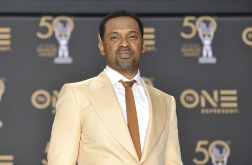 FILE - Mike Epps poses in the press room at the 50th annual NAACP Image Awards, March 30, 2019, at the Dolby Theatre in Los Angeles. Federal agents confiscated a loaded gun found in the hand luggage of actor and comedian Epps, who was trying to board a flight from Indianapolis International Airport, airport police said. (Photo by Richard Shotwell/Invision/AP, File)