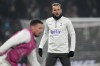 Tottenham's Harry Kane warms-up before the Champions League round of 16 second leg soccer match between Tottenham Hotspur and AC Milan at the Tottenham Hotspur stadium in London, Wednesday, March 8, 2023. (AP Photo/Alastair Grant)