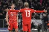 Bayern's Eric Maxim Choupo-Moting, right, celebrates after scoring his side's opening goal during the Champions League round of 16 second leg soccer match between Bayern Munich and Paris Saint Germain at the Allianz Arena in Munich, Germany, Wednesday, March 8, 2023. (AP Photo/Matthias Schrader)