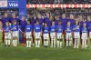 Canada players wear purple shirts with 