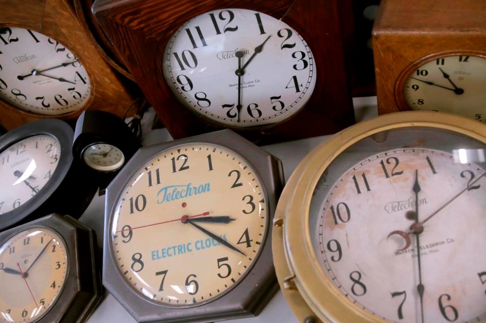 Antique clocks are displayed at the Electric Time Company, in Medfield, Massachusetts on March 5, 2020. U.S. legislation that could trigger an end to seasonal time changes in Canada is moving forward again, as Canadians get ready to wind their clocks ahead an hour before going to bed Saturday night. THE CANADIAN PRESS/AP, Charles Krupa