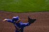Chicago Cubs center fielder Cody Bellinger (24) reaches to catch a fly ball hit by Colorado Rockies' C.J. Cron (25) during the fifth inning of a spring training baseball game in Scottsdale, Ariz., Sunday, March 5, 2023. Cody Bellinger had two RBIs, including a home run that kick-started Chicago's late run to pull ahead and away as the Cubs defeated Canada 11-7 on Wednesday.THE CANADIAN PRESS/AP, Ashley Landis