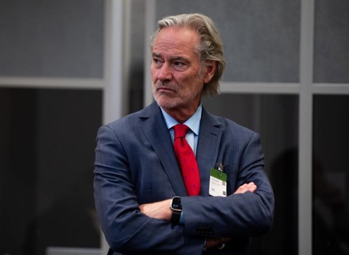 Michael McCain, Executive Chair of the Board and CEO of Maple Leaf Foods Inc. waits to appear as a witness at the Standing Committee on Agriculture and Agri-Food investigating food price inflation in Ottawa, on Monday, March 6, 2023. THE CANADIAN PRESS/Spencer Colby