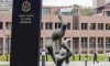 FILE - A man walks by the European Court of Justice in Luxembourg, Oct. 5, 2015. A senior legal adviser said Thursday, March 9, 2023 that UEFA rules on homegrown players are partially incompatible with the European Union's free movement laws, although quotas might be legitimate in order to develop and recruit youngsters.(AP Photo/Geert Vanden Wijngaert, File)