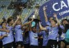 Players of Ecuador's Independiente del Valle celebrate with the trophy after winning the Recopa Sudamericana final soccer match against Brazil's Flamengo at Maracana stadium, in Rio de Janeiro, Brazil, Tuesday, Feb. 28, 2023. (AP Photo/Bruna Prado)