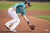 Seattle Mariners third baseman Sam Haggerty fields the ball to put out Chicago Cubs' Tucker Barnhart during the second inning of a spring training baseball game, Monday, March 6, 2023, in Peoria, Ariz. Kaden Polcovich's two-run homer in the eighth inning lifted the Seattle Mariners to a 5-3 win over Canada on Thursday in an exhibition game leading up to the World Baseball Classic. THE CANADIAN PRESS/AP, Abbie Parr