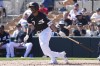 FILE - Chicago White Sox's Tim Anderson (7) watches his run-scoring double against the Seattle Mariners during the third inning of a spring training baseball game Feb. 27, 2023, in Phoenix. Anderson is among a star-studded lineup of batters who worked on their swings with Driveline Baseball during the offseason. (AP Photo/Ross D. Franklin, File)