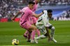 Espanyol's Ruben Sanchez, left, and Real Madrid's Vinicius Junior fight for the ball during a Spanish La Liga soccer match between Real Madrid and Espanyol at the Santiago Bernabeu stadium in Madrid, Spain, Saturday, March 11, 2023. (AP Photo/Bernat Armangue)