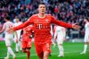 Benjamin Pavard of Munich celebrates his side's second goal during a German Bundesliga match between FC Bayern Munich and FC Augsburg in Munich, Germany, Saturday, March 11, 2023. (Sven Hoppe/dpa via AP)