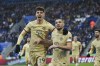 Chelsea's Mateo Kovacic, right, is congratulated by teammate Kai Havertz after scoring his side's 3rd goal during the English Premier League soccer match between Leicester City and Chelsea at King Power stadium in Leicester, England, Saturday, March 11, 2023. (AP Photo/Rui Vieira)