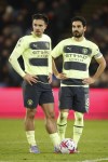 Manchester City's Jack Grealish, left, Manchester City's Ilkay Gundogan during the English Premier League soccer match between Crystal Palace and Manchester City at Selhurst Park stadium, in London, Saturday, March 11, 2023. (AP Photo/David Cliff)