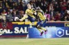 Real Salt Lake defender Jasper Loeffelsend (28) and forward Carlos Andrés Gómez (11) jump for the ball during the team's MLS soccer match against Austin FC on Saturday, March 11, 2023, in Sandy, Utah. (Ryan Sun/The Deseret News via AP)