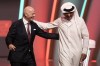 FILE - FIFA President Gianni Infantino, left, and Emir of Qatar Sheikh Tamim bin Hamad Al Thani leave the stage before the 2022 soccer World Cup draw at the Doha Exhibition and Convention Center in Doha, Qatar, on April 1, 2022. A spying operation on behalf of World Cup host Qatar bugged a 2017 hotel meeting between Infantino and Switzerland’s then-attorney general during an investigation of soccer officials, Swiss daily Neue Zürcher Zeitung reported Sunday March 12, 2023. (AP Photo/Hassan Ammar, File)