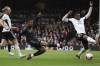 Arsenal's Gabriel Jesus, center, kicks the ball during the English Premier League soccer match between Fulham and Arsenal at Craven Cottage stadium in London, Sunday, March 12, 2023. (AP Photo/Ian Walton)