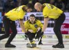 Manitoba's Matt Dunstone calls a sweep on a shot against Wild Card 1's Brendan Bottcher in the semifinal game at the 2023 Tim Hortons Brier in London, Ont., Sunday, March 12, 2023. THE CANADIAN PRESS/Frank Gunn