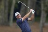 Tom Hoge hits from the 15th fairway during the final round of The Players Championship golf tournament, Sunday, March 12, 2023, in Ponte Vedra Beach, Fla. (AP Photo/Charlie Neibergall)