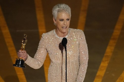 Jamie Lee Curtis accepts the award for best performance by an actress in a supporting role for 